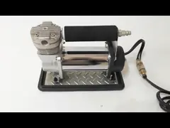 Máy nén khí 12vdc kim loại bạc xách tay Bảo hành một năm